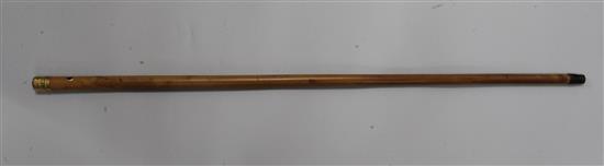 A 22ct gold mounted malacca cane dated 1774 by Lawrence Johnson,